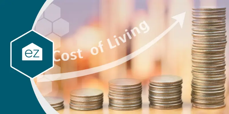 cost of living with curved arrow up against coins