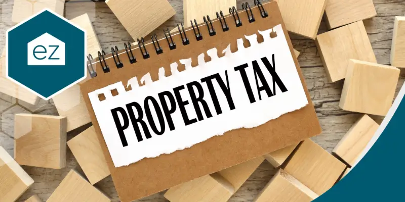 a notebook with Property Tax written in front