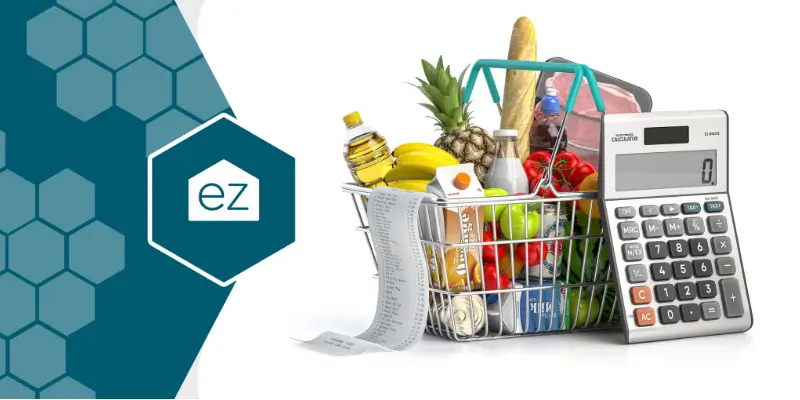 grocery basket with goods and calculator