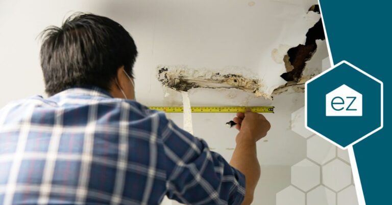 Resident checking on a crack on his ceiling
