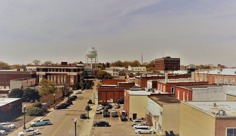 View of the downtown area with buildings and cars in Concord, North Carolina
